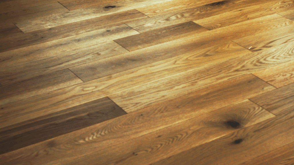 Close-up of wide-plank rustic hardwood floor with natural grain